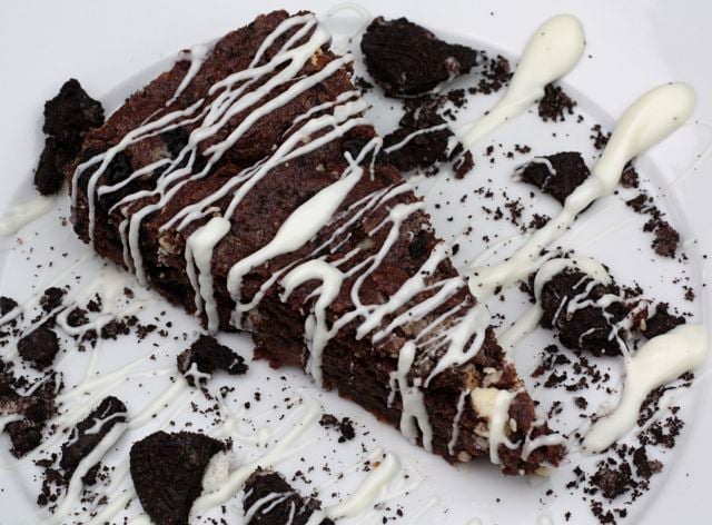 Oreo Brownies with White Chocolate Recipe on twopeasandtheirpod.com These easy brownies are a great dessert for celebrations or any day! They are SO good! Oreo Brownies with White Chocolate Recipe