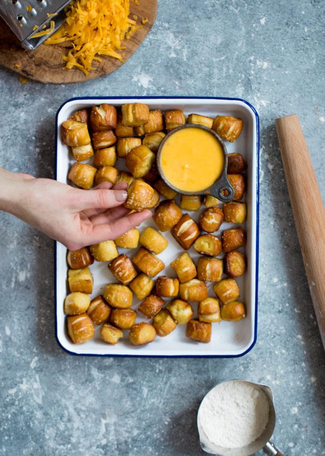 Homemade Soft Pretzel Bites Recipe on twopeasandtheirpod.com The perfect snack for game day or parties! They are easy to make and fun to eat! Homemade Soft Pretzel Bites Recipe