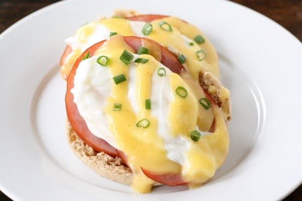 eggs-benedict-recipe Eggs Benedict on plate with hollandaise sauce