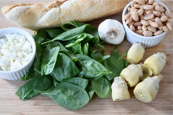 spianch-artichoke-white-bean-crostini