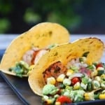 shrimp tacos served with grilled vegetable salsa