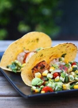 shrimp tacos served with grilled vegetable salsa