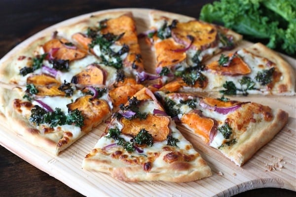 Sweet Potato Kale Pizza Recipe on twopeasandtheirpod.com One of my all-time favorite pizzas! Sweet Potato Kale Pizza Recipe on twopeasandtheirpod.com One of my all-time favorite pizzas!