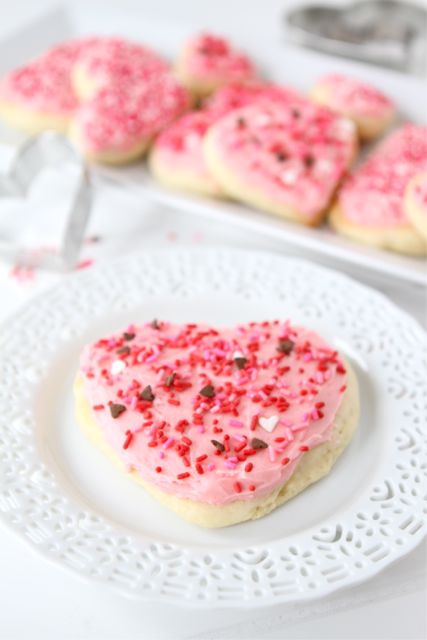 Lofthouse Sugar Cookies are easy to make at home and super soft. The perfect sugar cookies for any occasion! #sugarcookies #cookies #lofthouse Lofthouse Cookie Recipe - Sugar Cookies on Plate