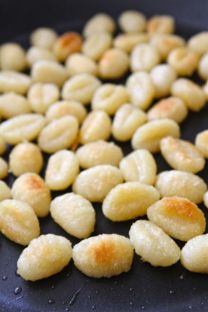 Crispy Gnocchi with Basil Pesto Recipe on twopeasandtheirpod.com Crispy Gnocchi with Basil Pesto