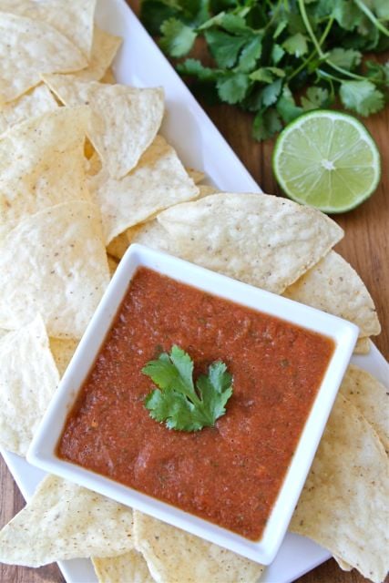 Restaurant Style Salsa Recipe on twopeasandtheirpod.com LOVE this easy blender salsa! It is SO good! Easy Blender Salsa Recipe to serve with chips