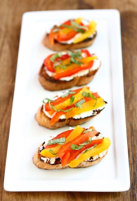 Goat Cheese & Roasted Pepper Crostini from www.twopeasandtheirpod.com #recipe
