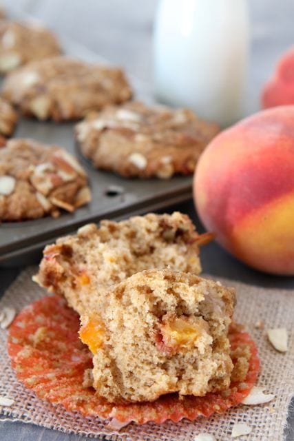 Peach Almond Muffin Recipe from www.twopeasandtheirpod.com #recipe