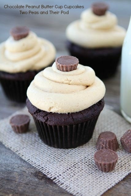 Chocolate Peanut Butter Cup Cupcakes from www.twopeasandtheirpod.com There's a Reese's PB Cup inside! #recipe #cupcake