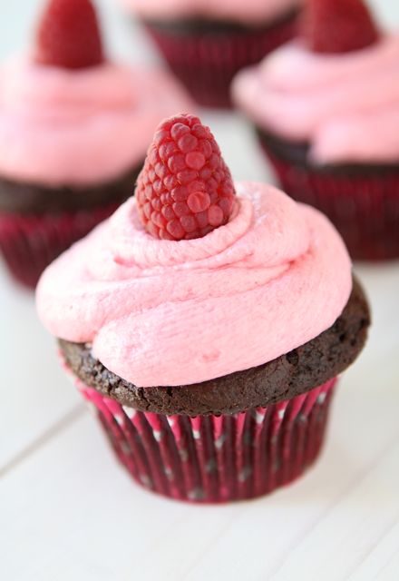 Dark Chocolate Cupcakes with Raspberry Buttercream from www.twopeasandtheirpod.com #recipe #cupcakes