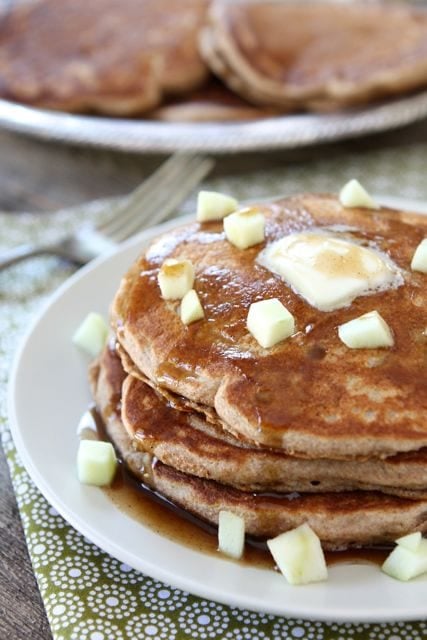 Whole Wheat Apple Cinnamon Pancakes with Cinnamon Syrup from Two Peas and Their Pod (www.twopeasandtheirpod.com) #recipe
