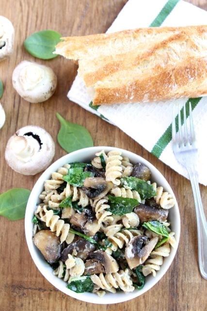 Creamy Goat Cheese Pasta with Spinach & Mushrooms from www.twopeasandtheirpod.com #recipe