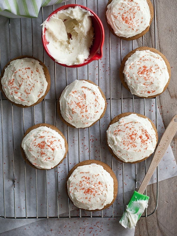 Soft Gingersnaps with White Chocolate Cream Cheese Frosting from www.twopeasandtheirpod.com #cookies #recipe #holiday