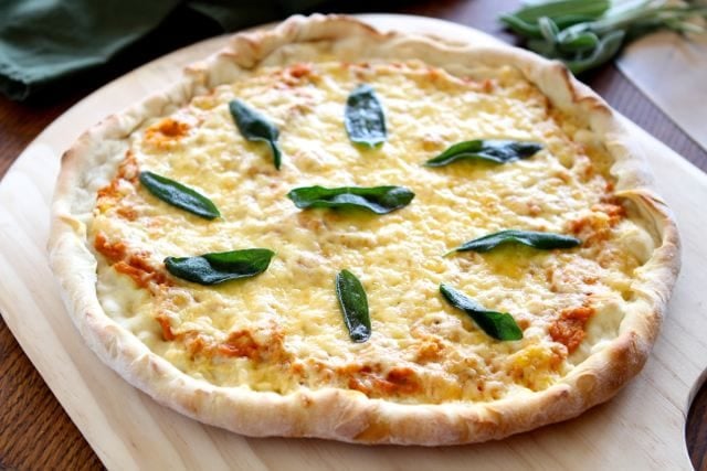 Pumpkin Pizza with Crispy Sage from www.twopeasandtheirpod.com #recipe #pumpkin