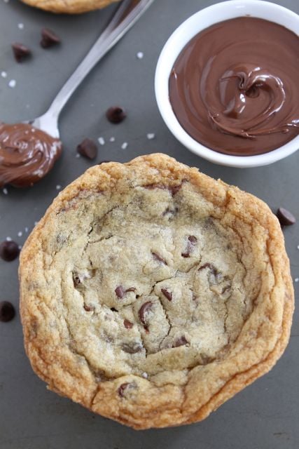 Giant Nutella Stuffed Chocolate Chip Cookies from www.twopeasandtheirpod.com #cookie #recipe