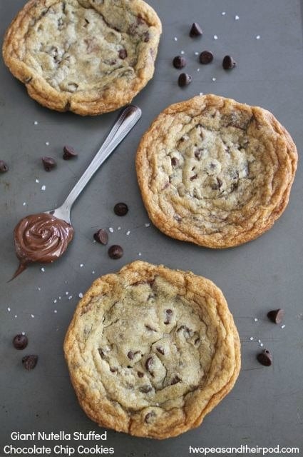 Giant Nutella Stuffed Chocolate Chip Cookies from www.twopeasandtheirpod.com #recipe #Nutella