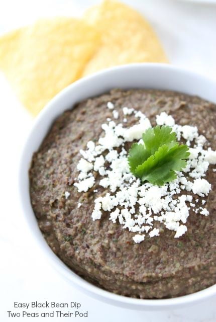 Easy Black Bean Dip from www.twopeasandtheirpod.com Easy black bean dip recipe served with cotija cheese