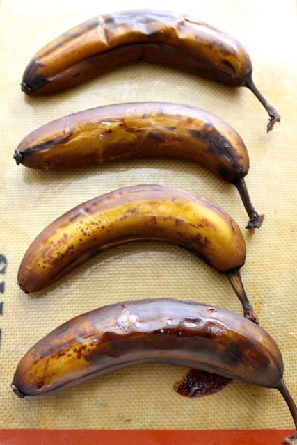Whole Wheat Roasted Banana Bread Recipe from www.twopeasandtheirpod.com #bread
