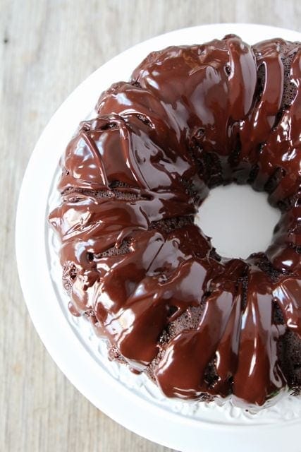 Chocolate Sour Cream Bundt Cake | Two Peas and Their Pod | www.twopeasandtheirpod.com Chocolate Bundt Cake on serving platter
