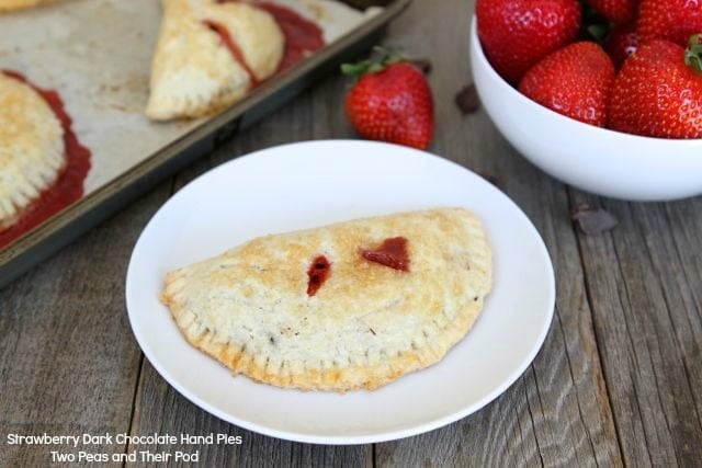 Strawberry Dark Chocolate Hand Pie Recipe from www.twopeasandtheirpod.com strawberry-dark-chocolate-hand-pies3