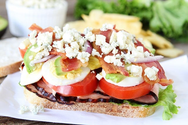 Cobb Salad Sandwich Recipe from www.twopeasandtheirpod.com How to make a cobb salad sandwich - layer lightly!