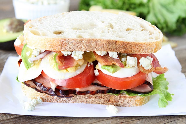 Cobb Salad Sandwich on www.twopeasandtheirpod.com A Cobb Salad in Sandwich Form! Cobb salad sandwich ready to serve