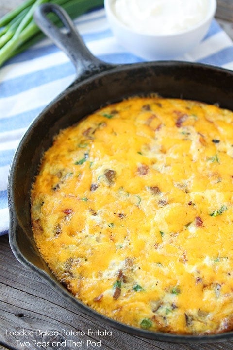 Loaded Baked Potato Frittata Recipe on www.twopeasandtheirpod.com baked frittata in cast iron pan