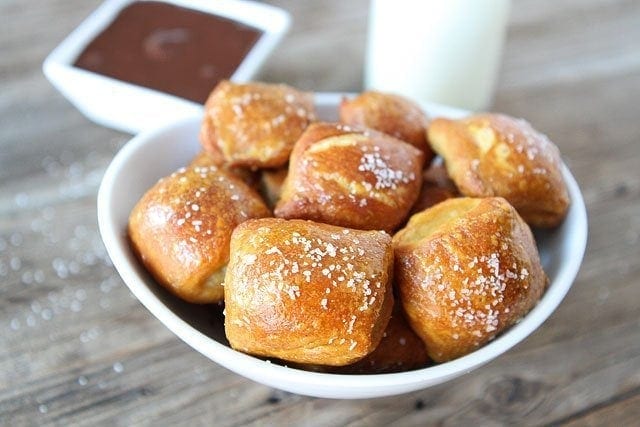 Homemade Pretzel Bites Filled with Peanut Butter and Dipped in Chocolate-recipe on www.twopeasandtheirpod.com Peanut-Butter-Filled-Pretzel-Bites-4