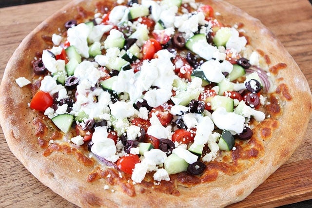 Greek Pizza on www.twopeasandtheirpod.com If you like Greek Salad, you will LOVE this Greek Pizza! Greek-Pizza-13
