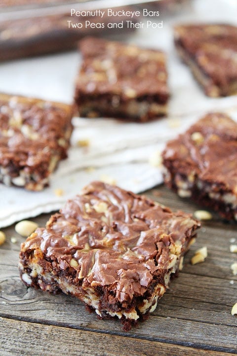 Peanutty Buckeye Bars on www.twopeasandtheirpod.com Chocolate and peanut butter lovers, these are for you! Peanutty-Buckeye-Bars-2