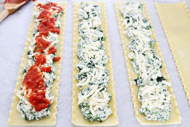 Spinach Artichoke Lasagna Roll Ups on twopeasandtheirpod.com How to Make Spinach Artichoke Lasagna Roll Ups