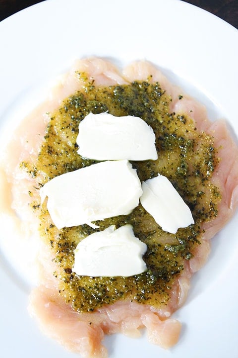 Mozzarella Pesto Stuffed Chicken Breasts Recipe on twopeasandtheirpod.com How to make Stuffed Chicken Breast Recipe - pounded chicken with filling