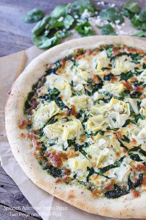 Spinach Artichoke Pesto Pizza Recipe on twopeasandtheirpod.com Spinach Artichoke Pesto Pizza Recipe on twopeasandtheirpod.com My all-time favorite pizza!