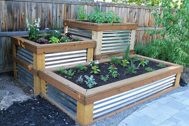 Build Your Own Raised Herb Garden on twopeasandtheirpod.com Build Your Own Raised Herb Garden on twopeasandtheirpod.com