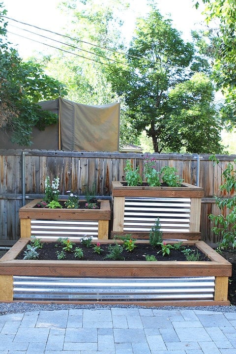 Build Your Own Raised Garden on twopeasandtheirpod.com Build Your Own Raised Garden on twopeasandtheirpod.com
