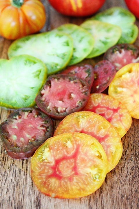 Easy Heirloom Tomato Pesto Galette Recipe on twopeasandtheirpod.com Easy Heirloom Tomato Pesto Galette Recipe on twopeasandtheirpod.com