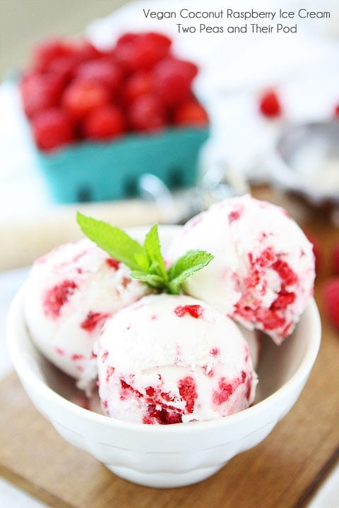 Vegan Coconut Raspberry Ice Cream Recipe on twopeasandtheirpod.com Only 4 ingredients! vegan ice cream made with 4 ingredients.