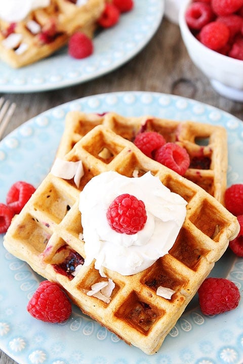 Coconut Raspberry Waffles with Coconut Whipped Cream Recipe on twopeasandtheirpod.com Our favorite waffles! Coconut Raspberry Waffles with Coconut Whipped Cream Recipe on twopeasandtheirpod.com Our favorite waffles!