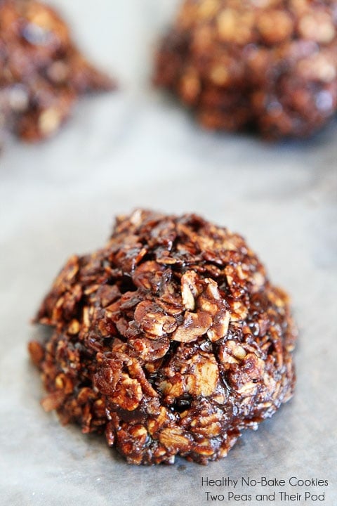 Healthy No-Bake Cookie Recipe on twopeasandtheirpod.com You don't have to turn on your oven to make these healthy and delicious cookies! Vegan no bake cookies setting up on wax paper
