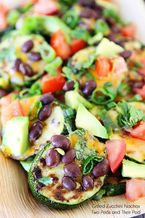 Grilled Zucchini Nachos on twopeasandtheirpod.com A great recipe for using up the summer zucchini! Grilled Zucchini Nachos on twopeasandtheirpod.com A great recipe for using up the summer zucchini!