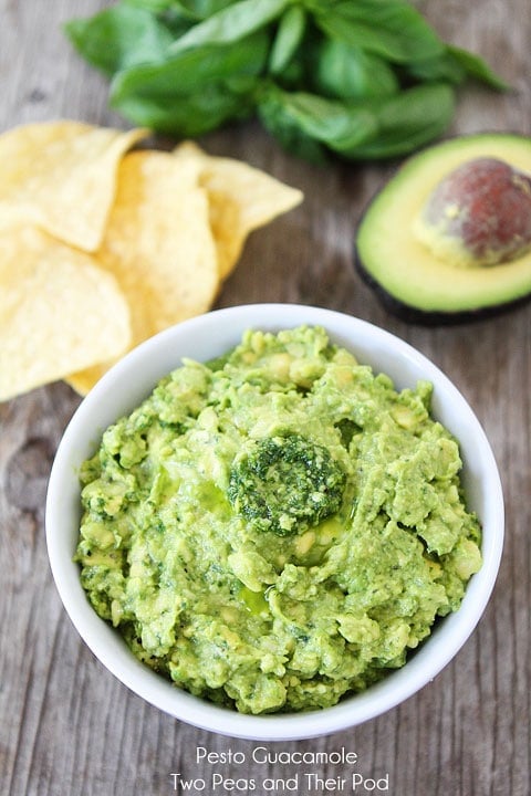 Pesto Guacamole Recipe on twopeasandtheirpod.com Perfect for parties or snacking! Pesto Guacamole Recipe on twopeasandtheirpod.com Perfect for parties or snacking!