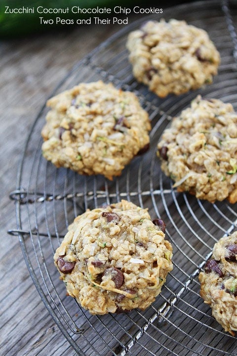 Zucchini Coconut Chocolate Chip Cookie Recipe are the perfect cookies for using up garden zucchini. You will LOVE these healthy cookies! #zucchini #zucchinicookies #cookies #recipe #dessert #vegetarian #baking #chocolatechip Zucchini cookies on cooling rack
