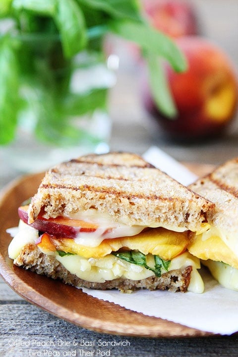 Grilled Peach, Brie, & Basil Sandwich with a drizzle of honey on twopeasandtheirpod.com Grilled Peach, Brie, & Basil Sandwich with a drizzle of honey on twopeasandtheirpod.com
