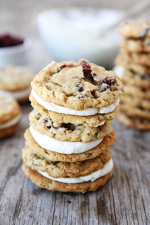 Oatmeal Cranberry Sandwich Cookies with White Chocolate Creme Filling on twopeasandtheirpod.com The perfect holiday cookie! Oatmeal Cranberry Sandwich Cookies with White Chocolate Creme Filling on twopeasandtheirpod.com The perfect holiday cookie!