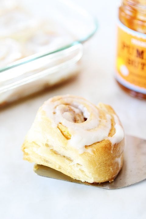 Easy Mini Pumpkin Cinnamon Rolls with Cream Cheese Frosting on twopeasandtheirpod.com Easy Mini Pumpkin Cinnamon Rolls with Cream Cheese Frosting on twopeasandtheirpod.com