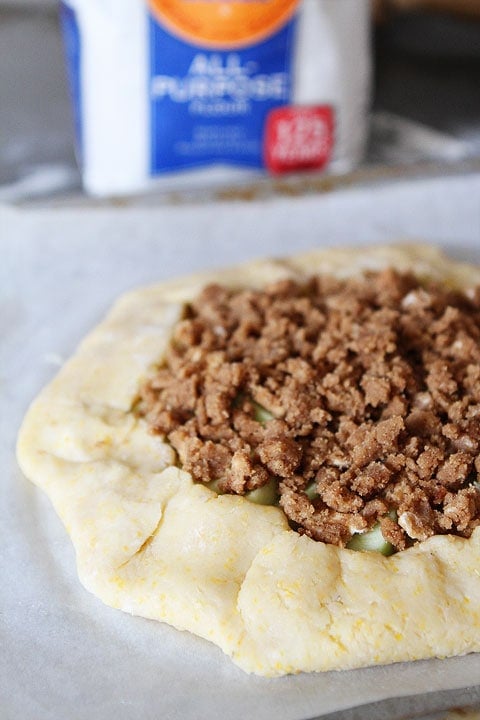 Apple Galette Recipe with cinnamon streusel topping on twopeasandtheirpod.com Apple Galette Recipe with cinnamon streusel topping on twopeasandtheirpod.com