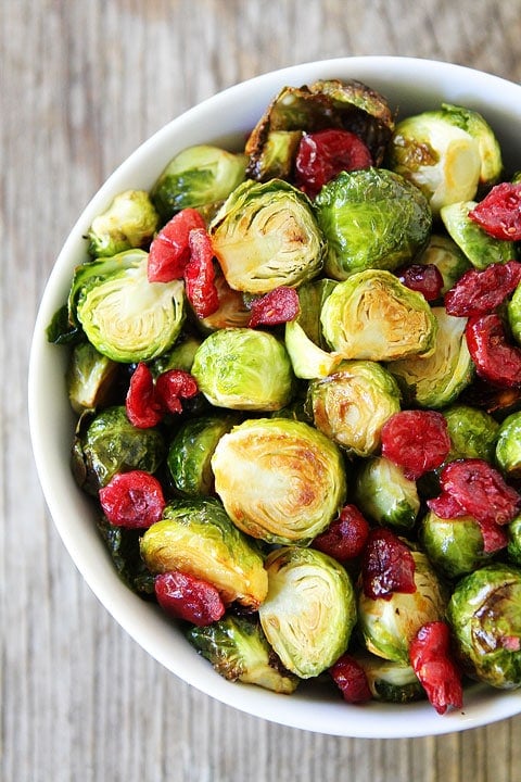 Cranberry Orange Roasted Brussels Sprouts Recipe on twopeasandtheirpod.com A great side dish to any holiday meal! Cranberry Orange Roasted Brussels Sprouts Recipe on twopeasandtheirpod.com A great side dish to any holiday meal!