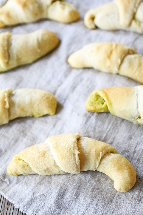 Pesto, Roasted Red Pepper, and Cheese Crescent Rolls on twopeasandtheirpod.com Easy recipe for the holidays! Pesto, Roasted Red Pepper, and Cheese Crescent Rolls on twopeasandtheirpod.com Easy recipe for the holidays!