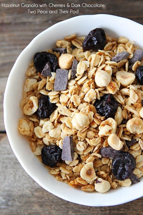 Hazelnut Granola Recipe Hazelnut Granola with Dried Cherries and Dark Chocolate Recipe on twopeasandtheirpod.com Great for breakfast, snack time, or dessert!