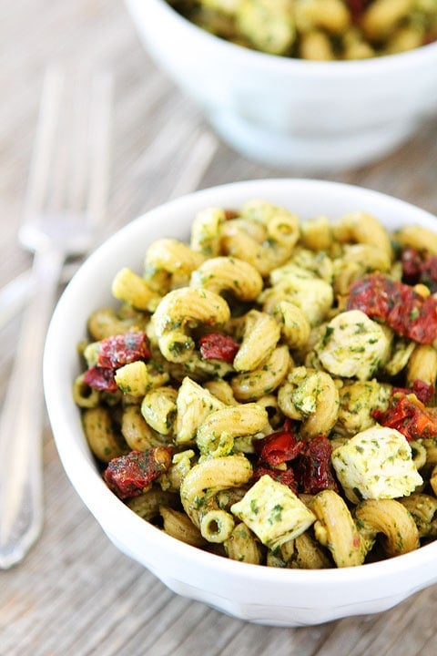 Pesto Chicken Pasta with Sun-Dried Tomatoes Recipe on twopeasandtheirpod.com So easy and SO good! Pesto Chicken Pasta with Sun-Dried Tomatoes Recipe on twopeasandtheirpod.com So easy and SO good!